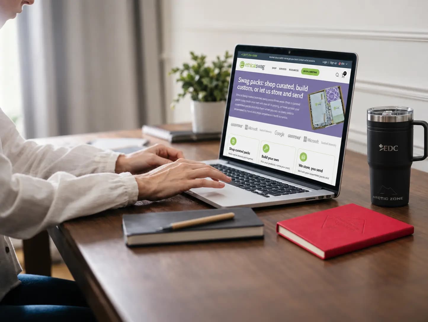 Person browsing the Ethical Swag Pack Builder on a laptop