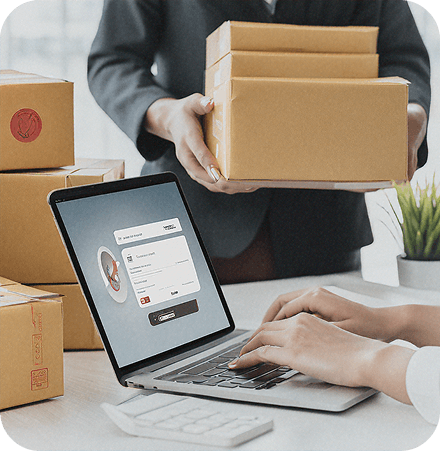 Hands weighing a package on a digital scale next to a laptop displaying an order fulfillment interface, signifying efficiency and time savings.