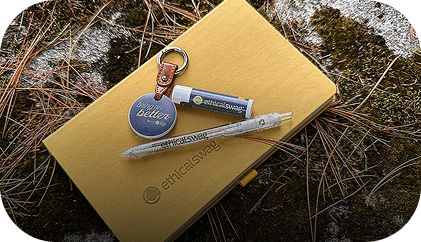 People browsing and inspecting branded merchandise items, representing branded merchandise services.